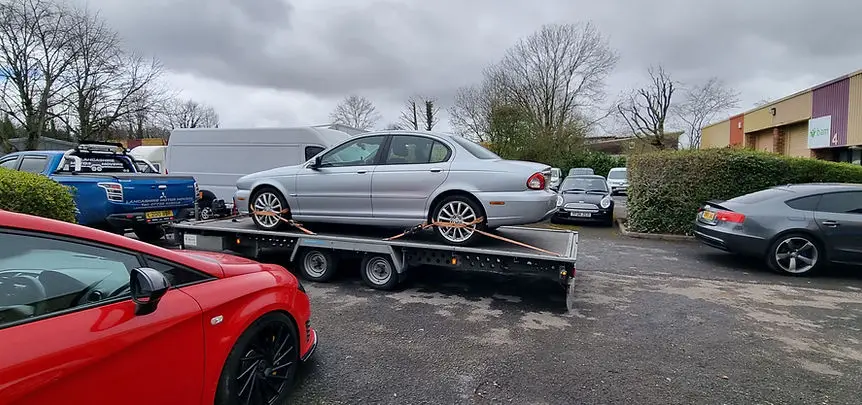 Two classic cars loaded for delivery Lancashire Motor Movers classic car transport