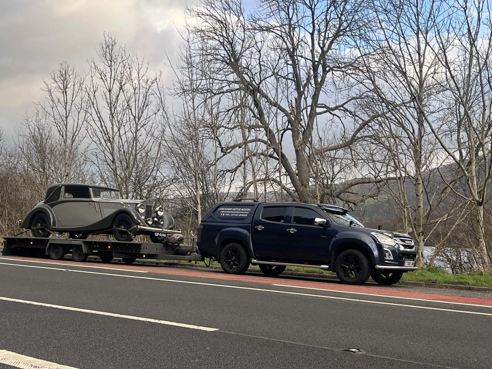 Classic car loaded on a trailer for transport Lancashire Motor Movers Lancashire